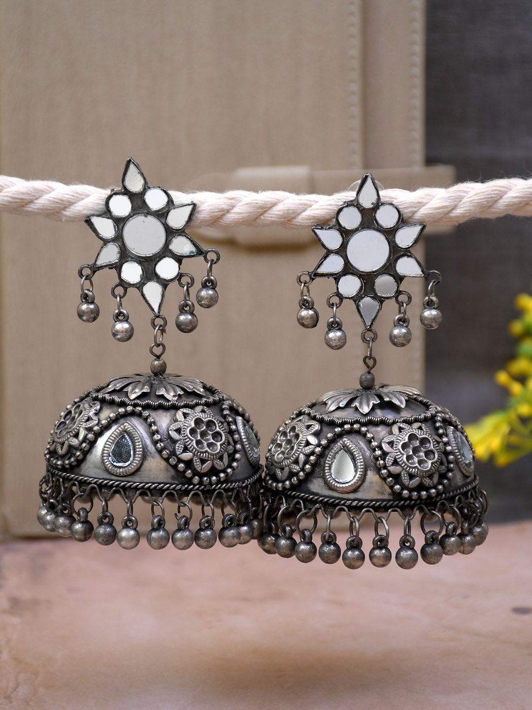 

Crunchy Fashion Silver-Plated Dome Shaped Jhumkas Earrings