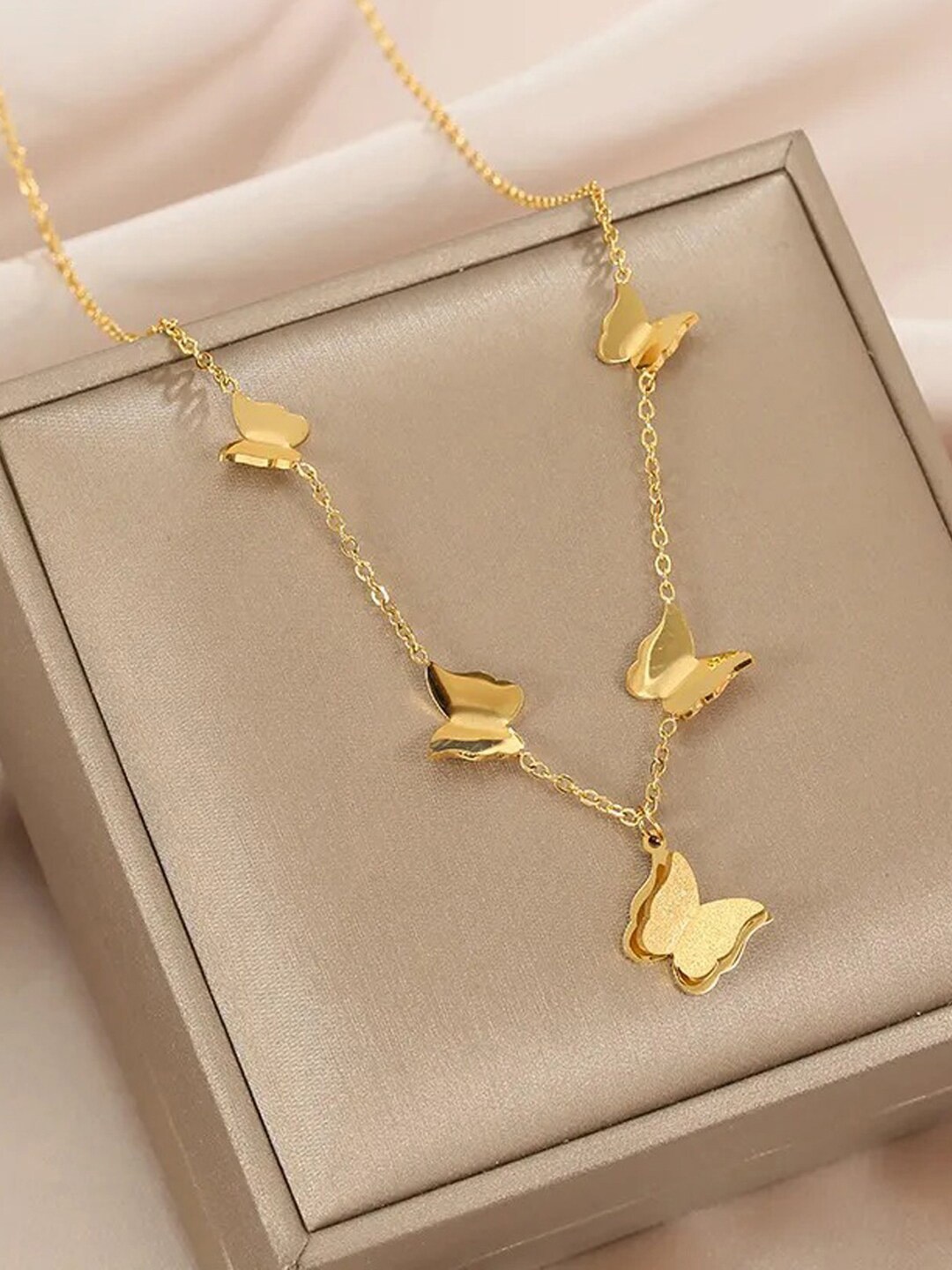 

Jewels Galaxy Stainless Steel Gold Plated Butterfly Themed Contemporary Pendant