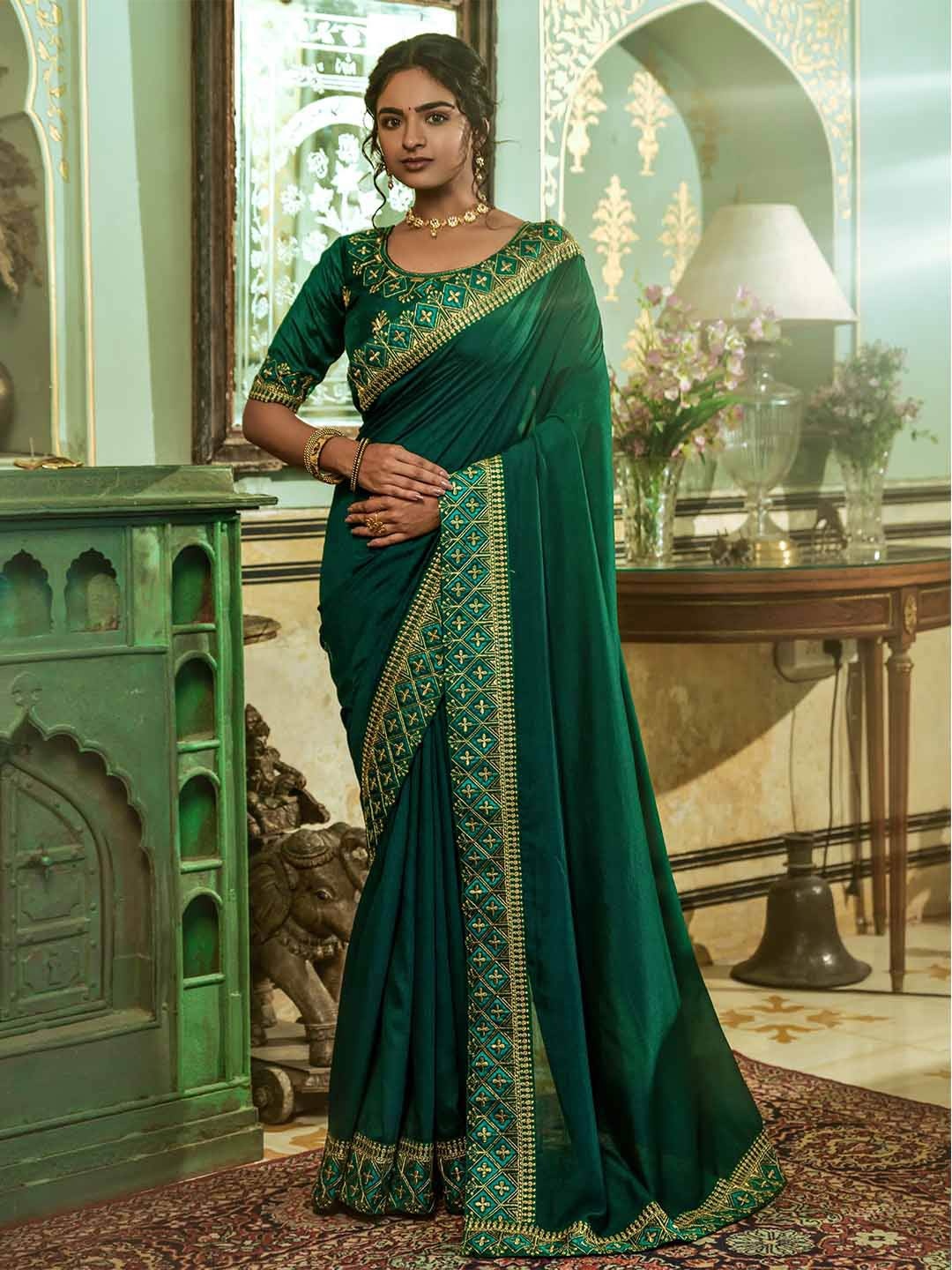 

Mitera Green Embroidered Art Silk Saree