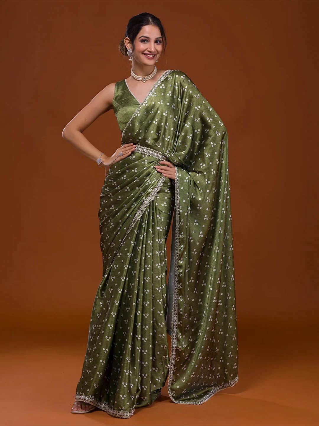 

Mitera Green Bandhani Satin Saree