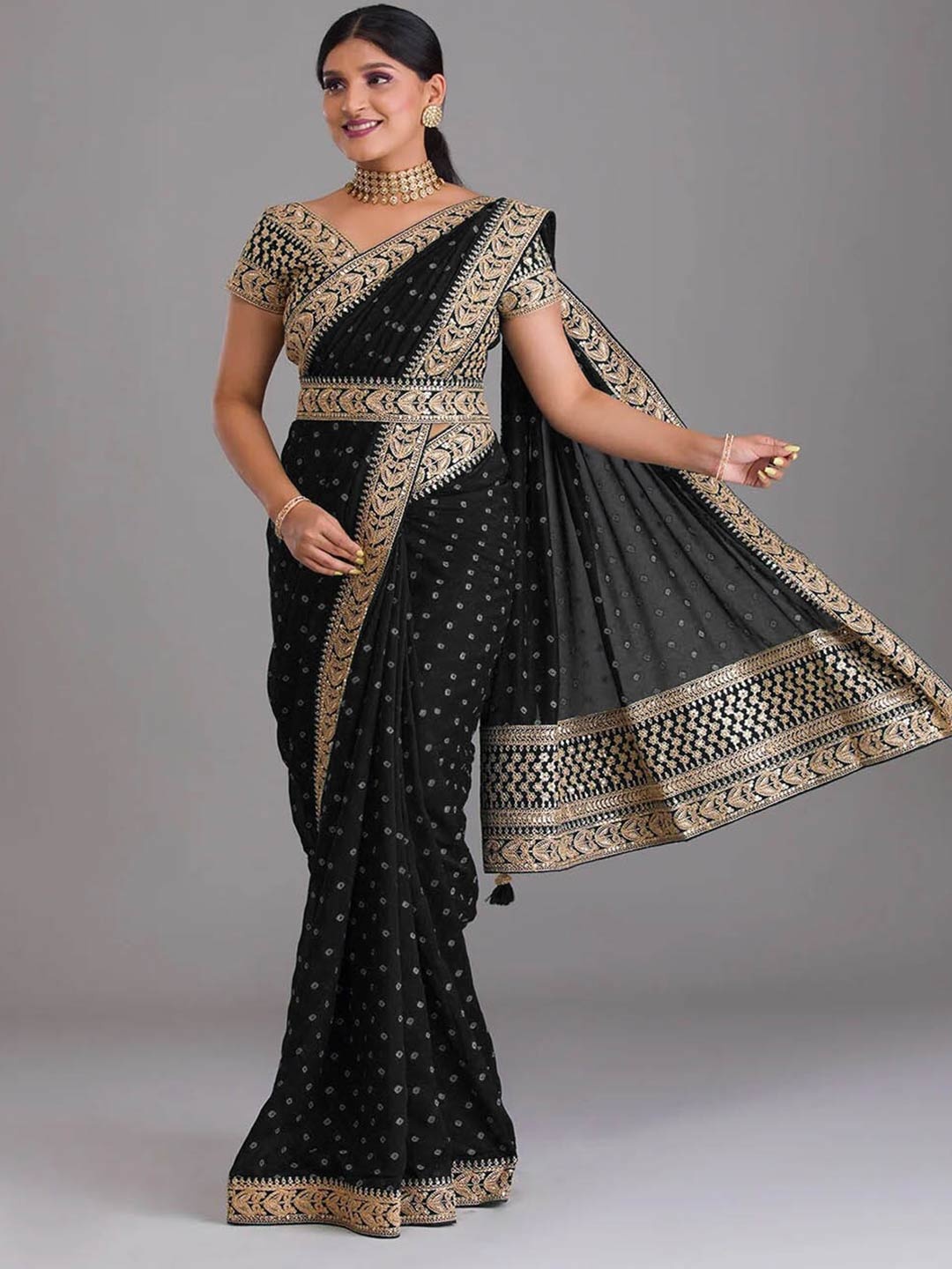 

Mitera Black & Gold-Toned Bandhani Sequinned Poly Chiffon Saree