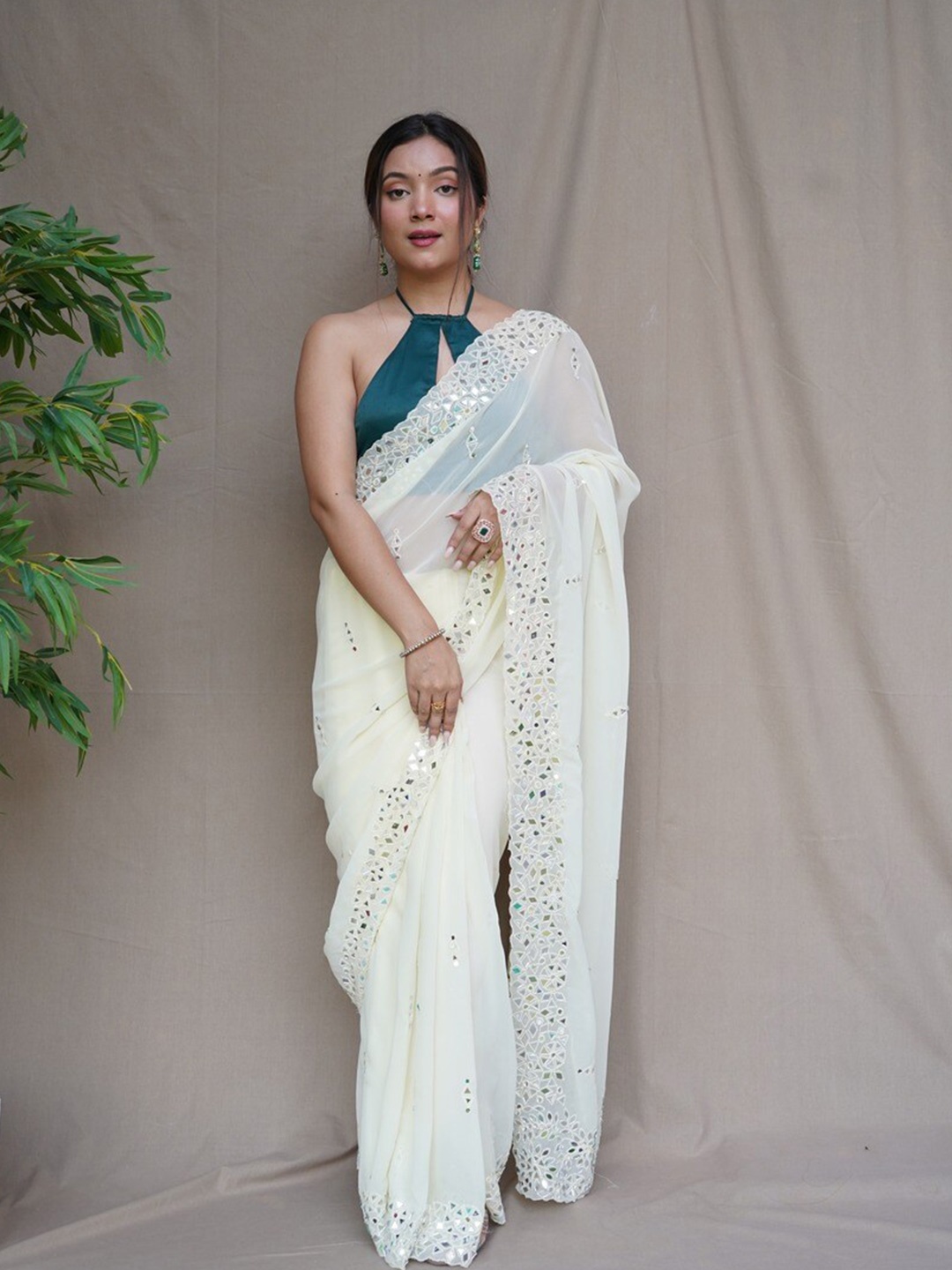 

Atulyam Tex World Embellished Mirror Work Pure Georgette Saree, White