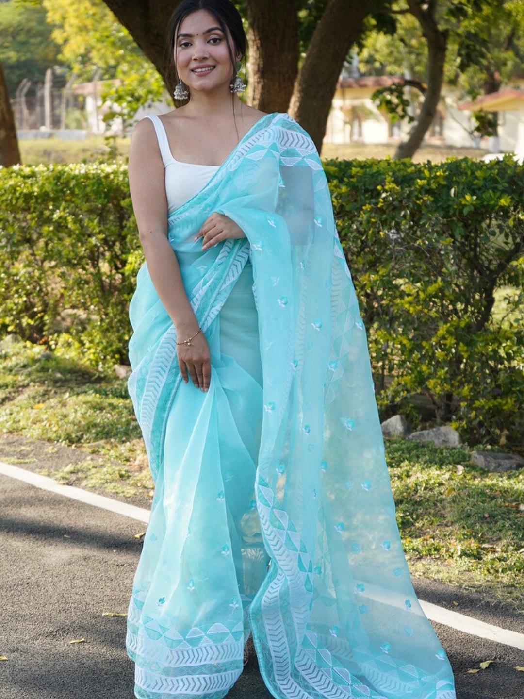 

Atulyam Tex World Floral Chikankari Organza Saree, Turquoise blue