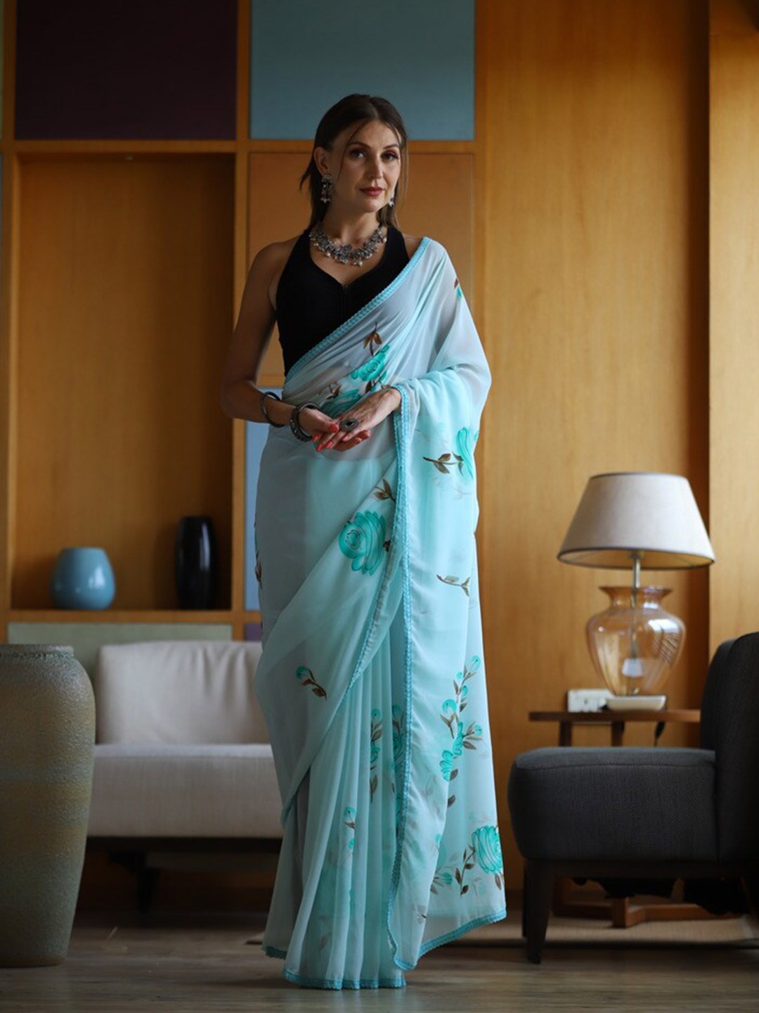 

Atulyam Tex World Floral Printed Pure Georgette Saree, Turquoise blue