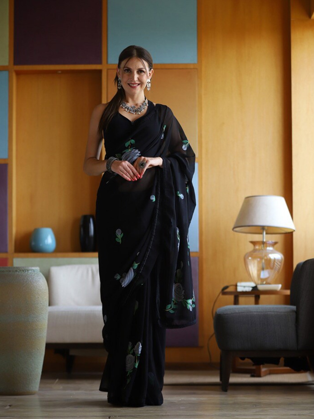 

Atulyam Tex World Floral Printed Pure Georgette Saree, Black