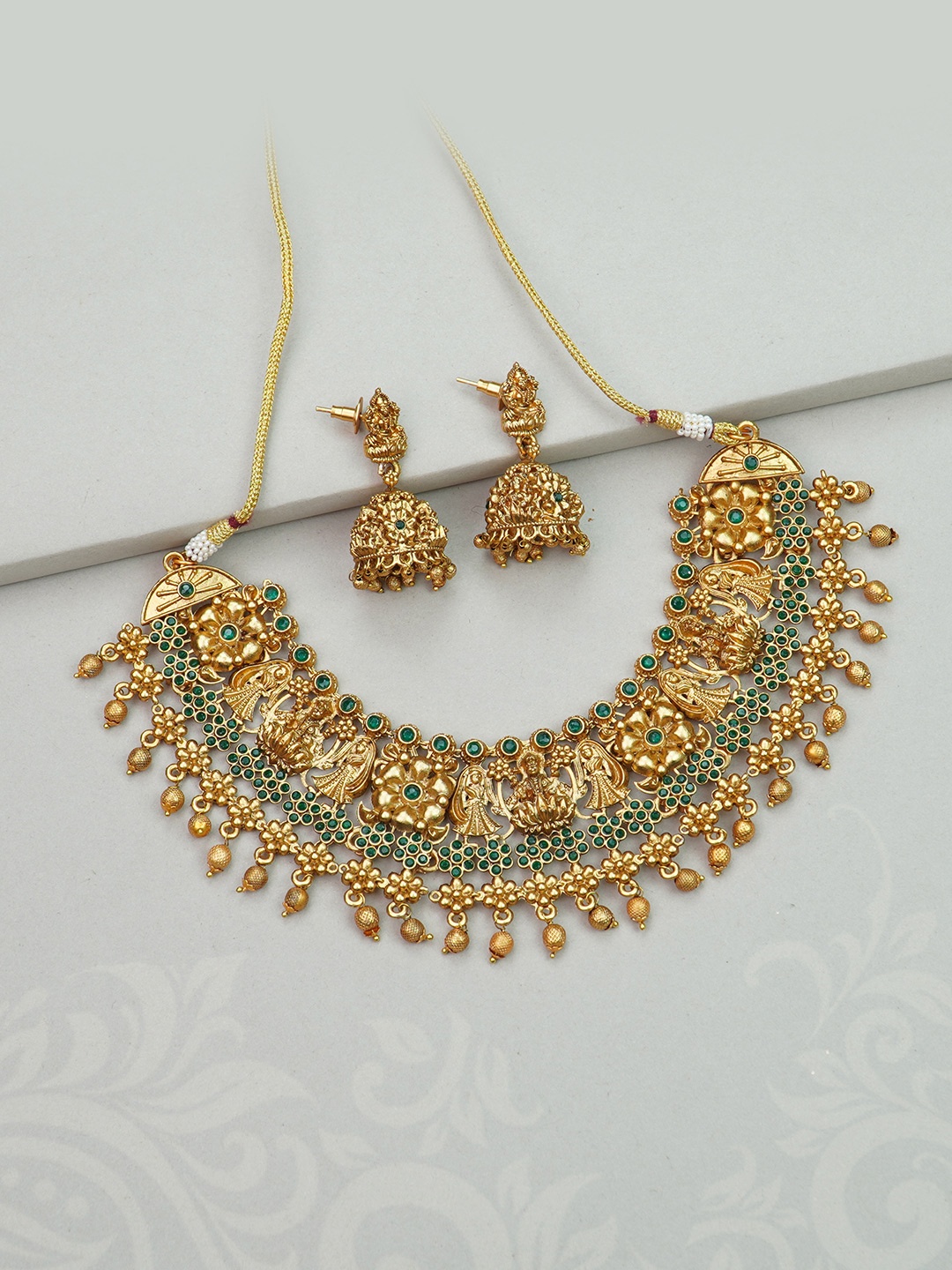 

Diksha collection Gold-Plated Stones-Studded & Beads-Beaded Jewellery Set