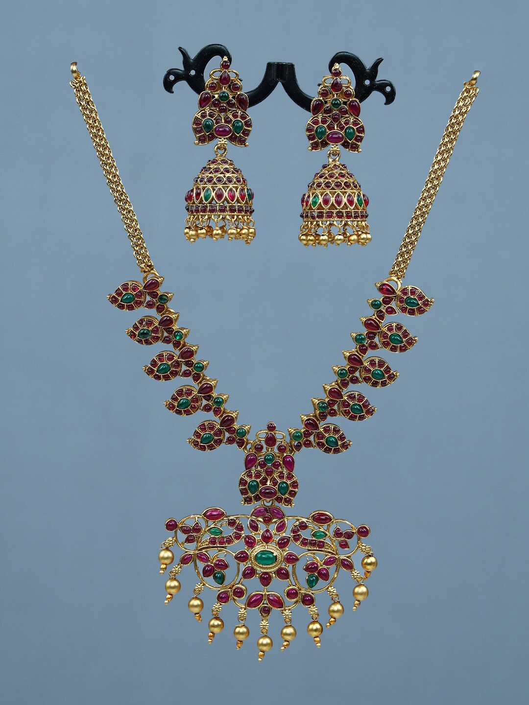 

Diksha collection Gold-Plated Stone-Studded Jewellery Set