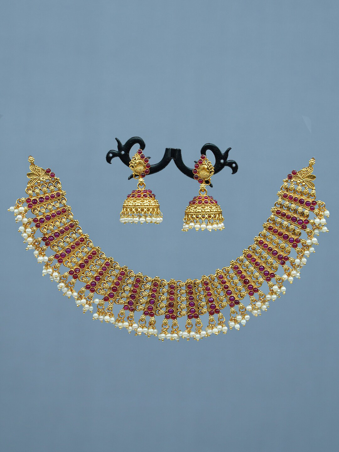 

Diksha collection Gold-Plated Stone-Studded & Beaded JewellerySet