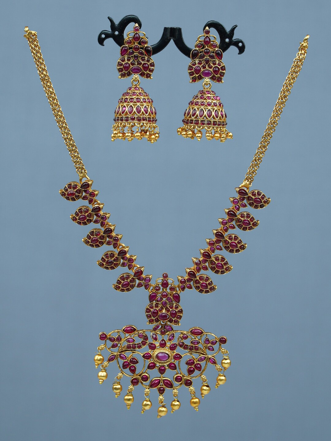 

Diksha collection Gold-Plated Stone-Studded JewellerySet