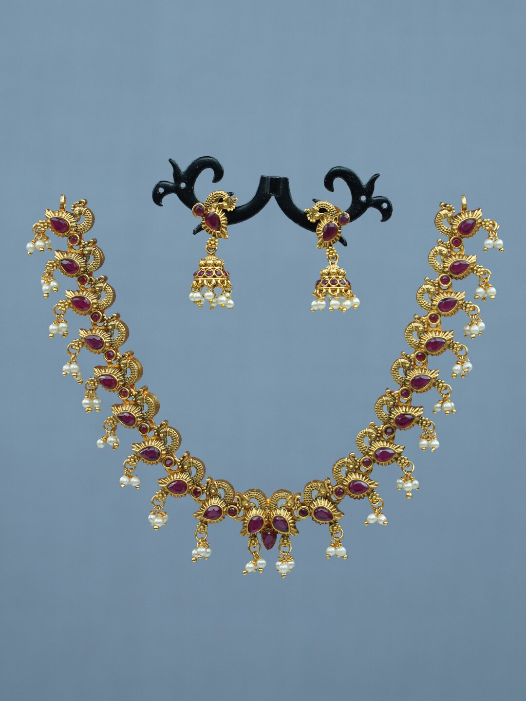 

Diksha collection Gold-Plated Stone-Studded & Beaded JewellerySet