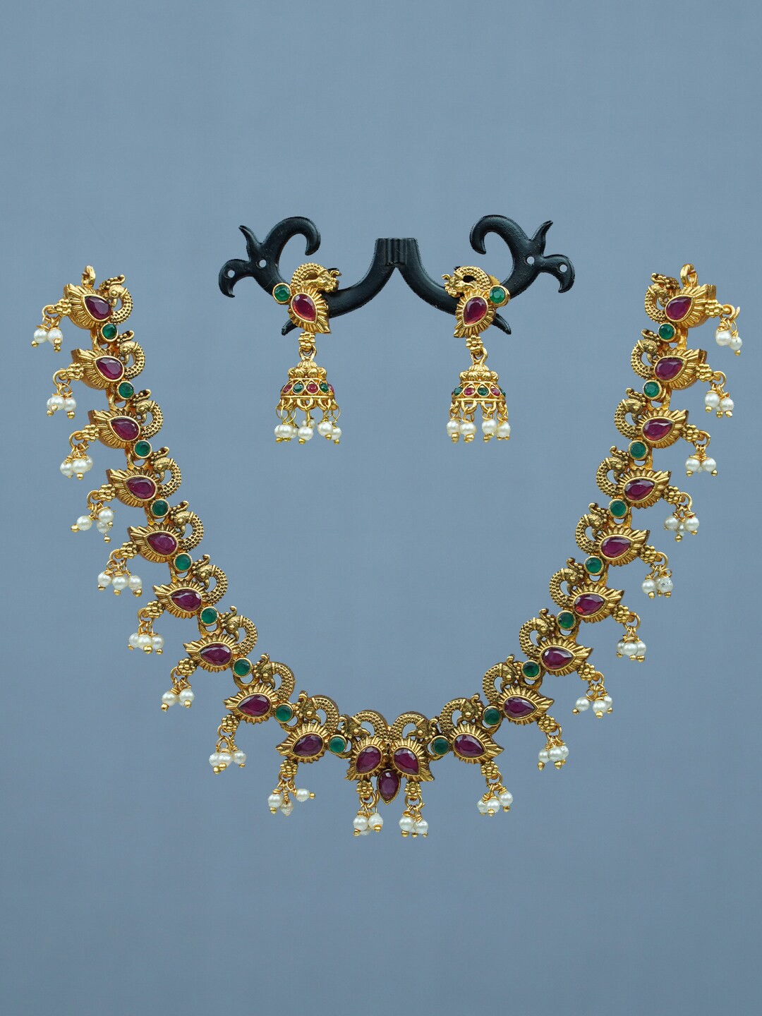 

Diksha collection Gold-Plated Stone-Studded & Beaded JewellerySet