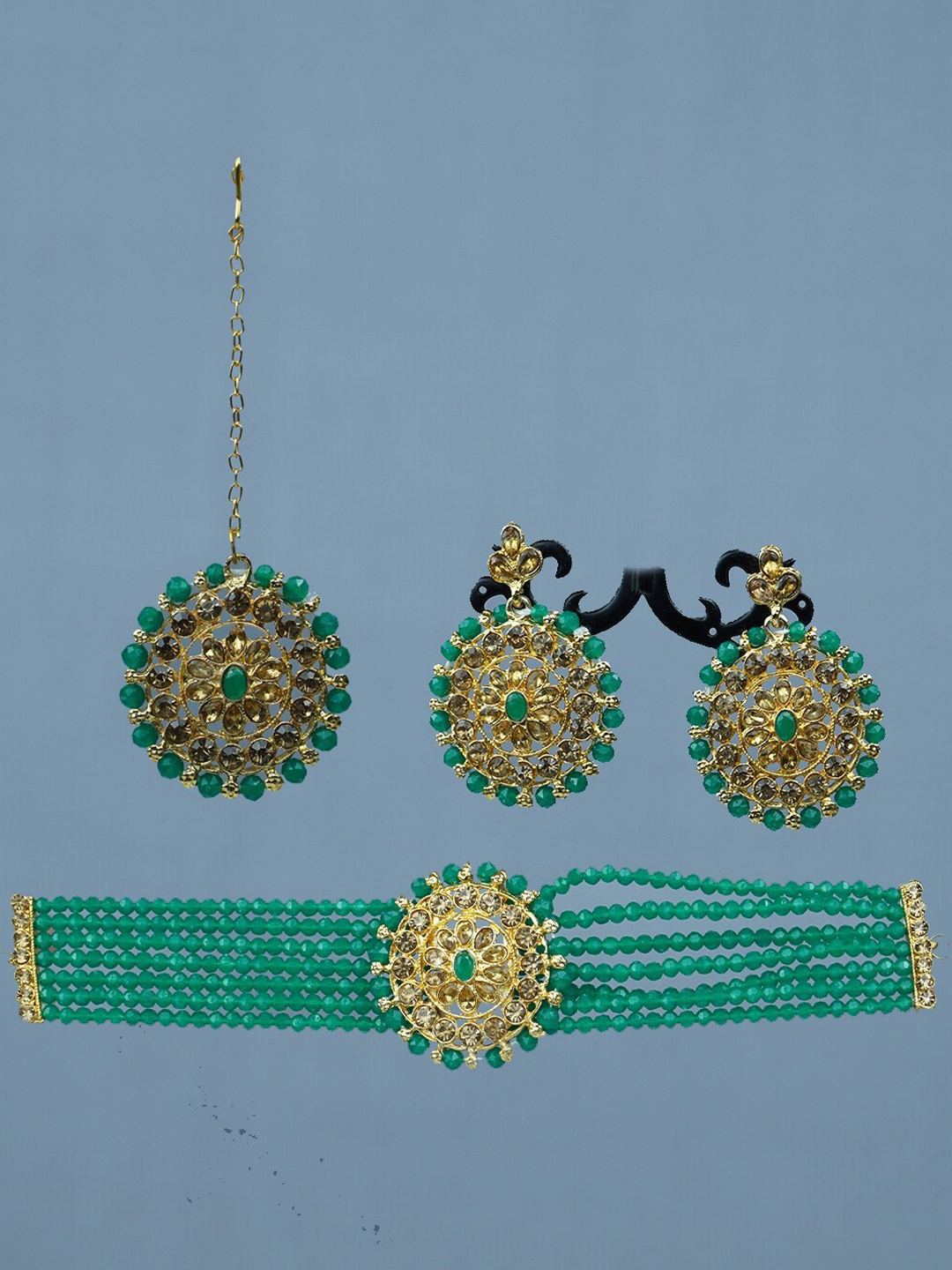 

Diksha collection Gold-Plated Stone-Studded & Beaded Jewellery Set