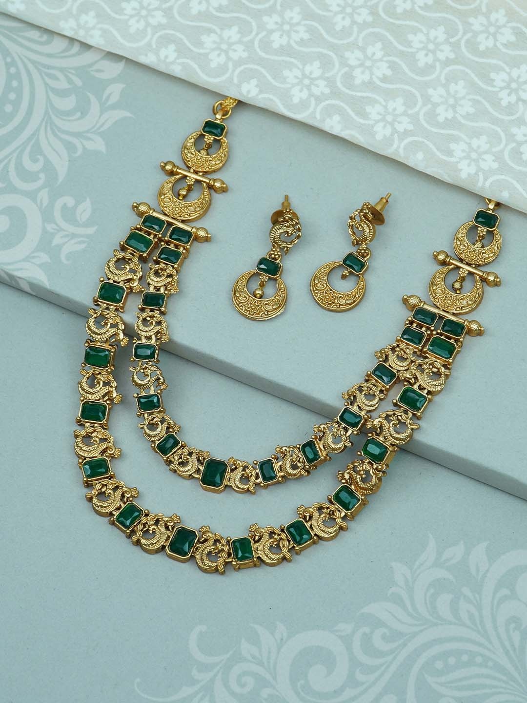 

Diksha collection Gold-Plated Stone-Studded Jewellery Set