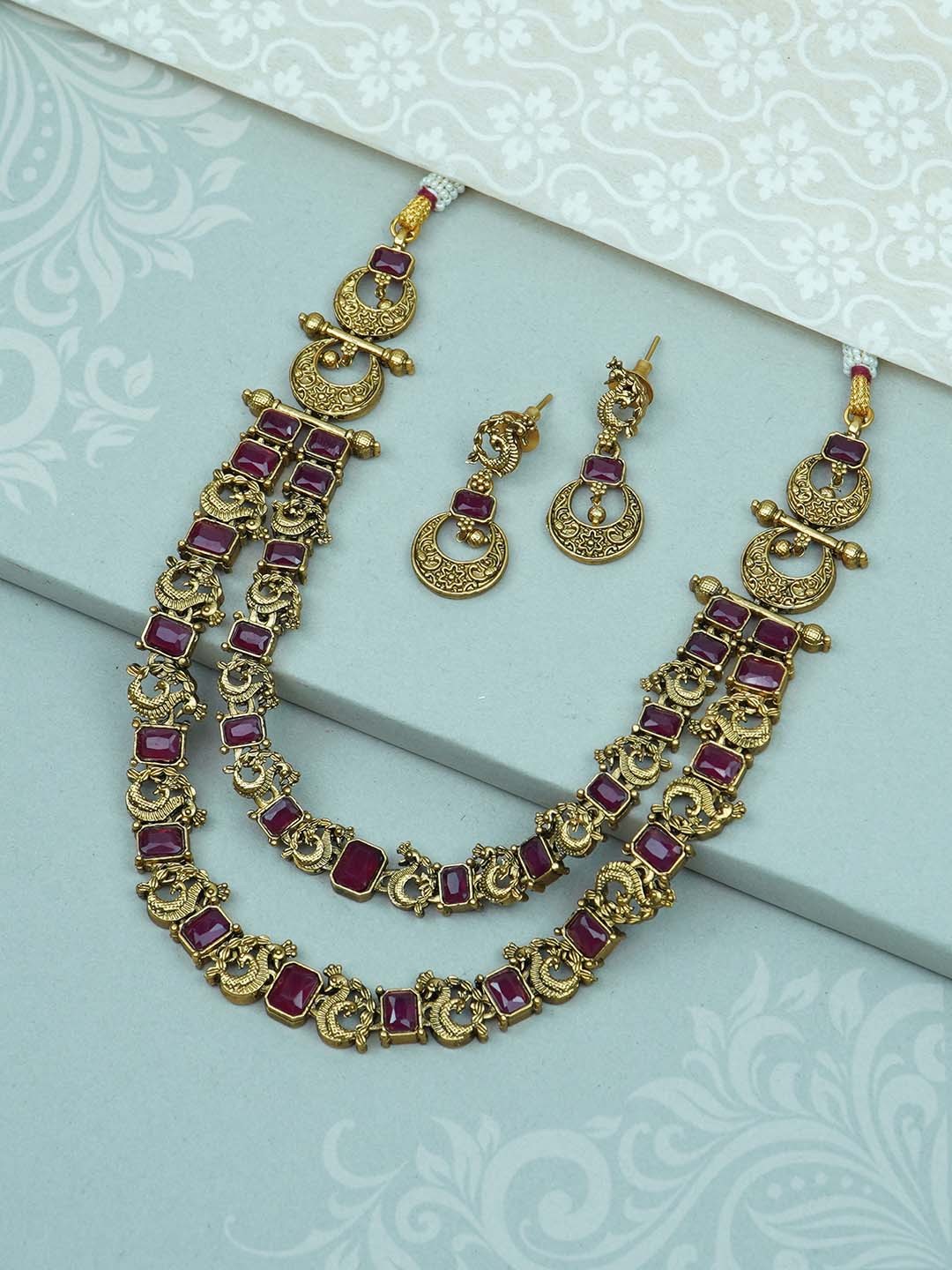 

Diksha collection Gold-Plated Stone-Studded Jewellery Set