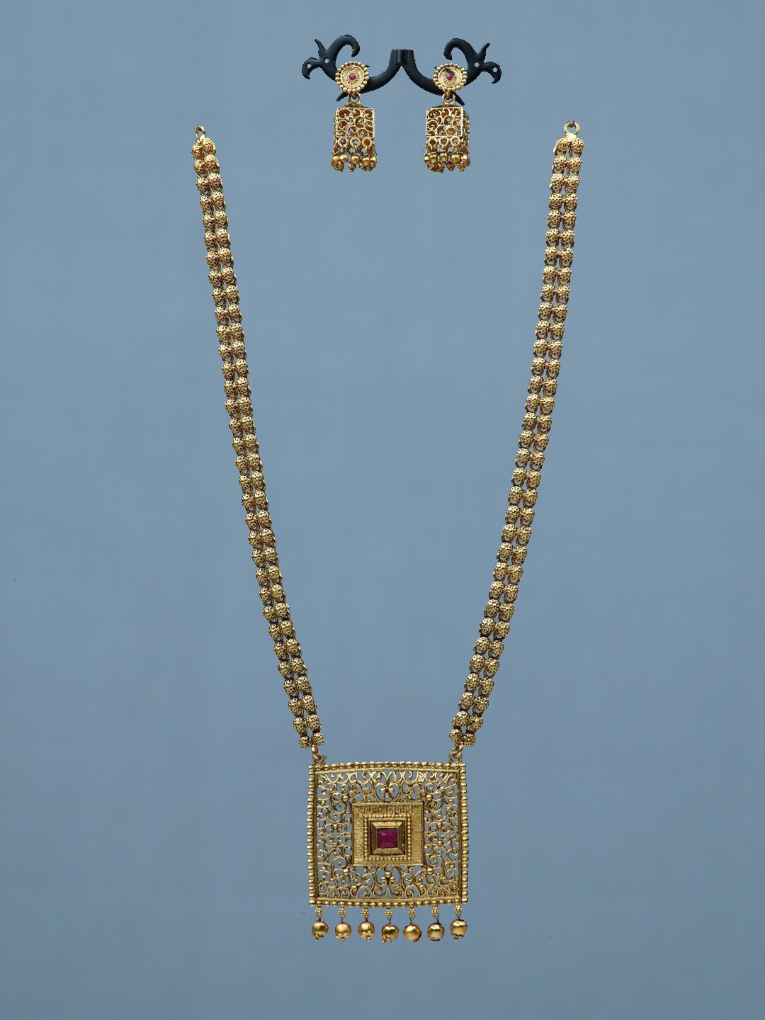 

Diksha collection Gold-Plated Stone-Studded Jewellery Set