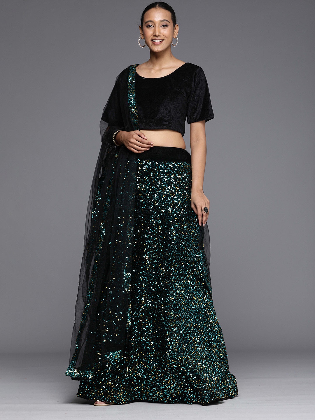 

Sangria Green Embellished Lehenga Choli