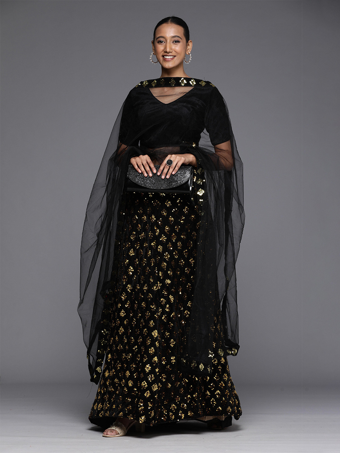 

Sangria Black & Gold Sequined Embellished Lehenga Choli With Dupatta