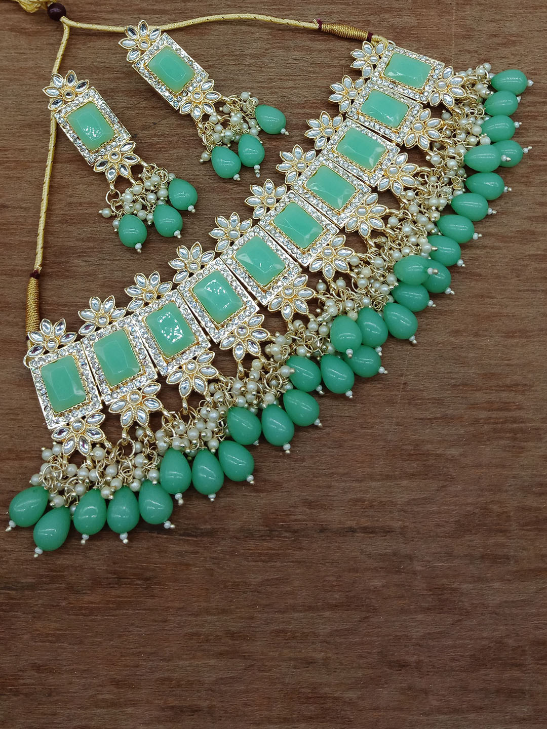 

AASHISH IMITATION Gold-Plated Stone-Studded & Beaded JewellerySet