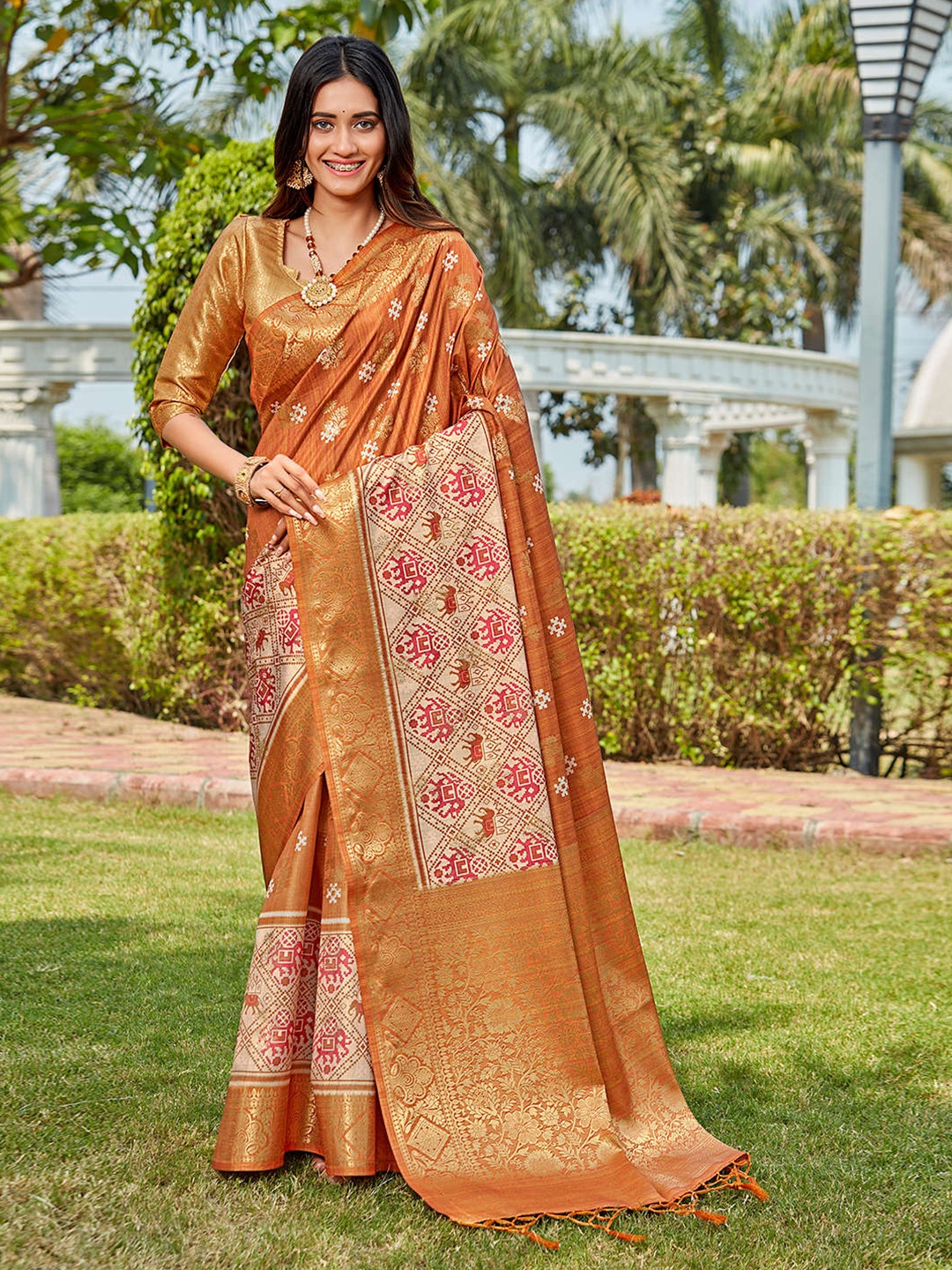 

Mitera Mustard & Red Ethnic Motifs Woven Design Zari Silk Blend Saree