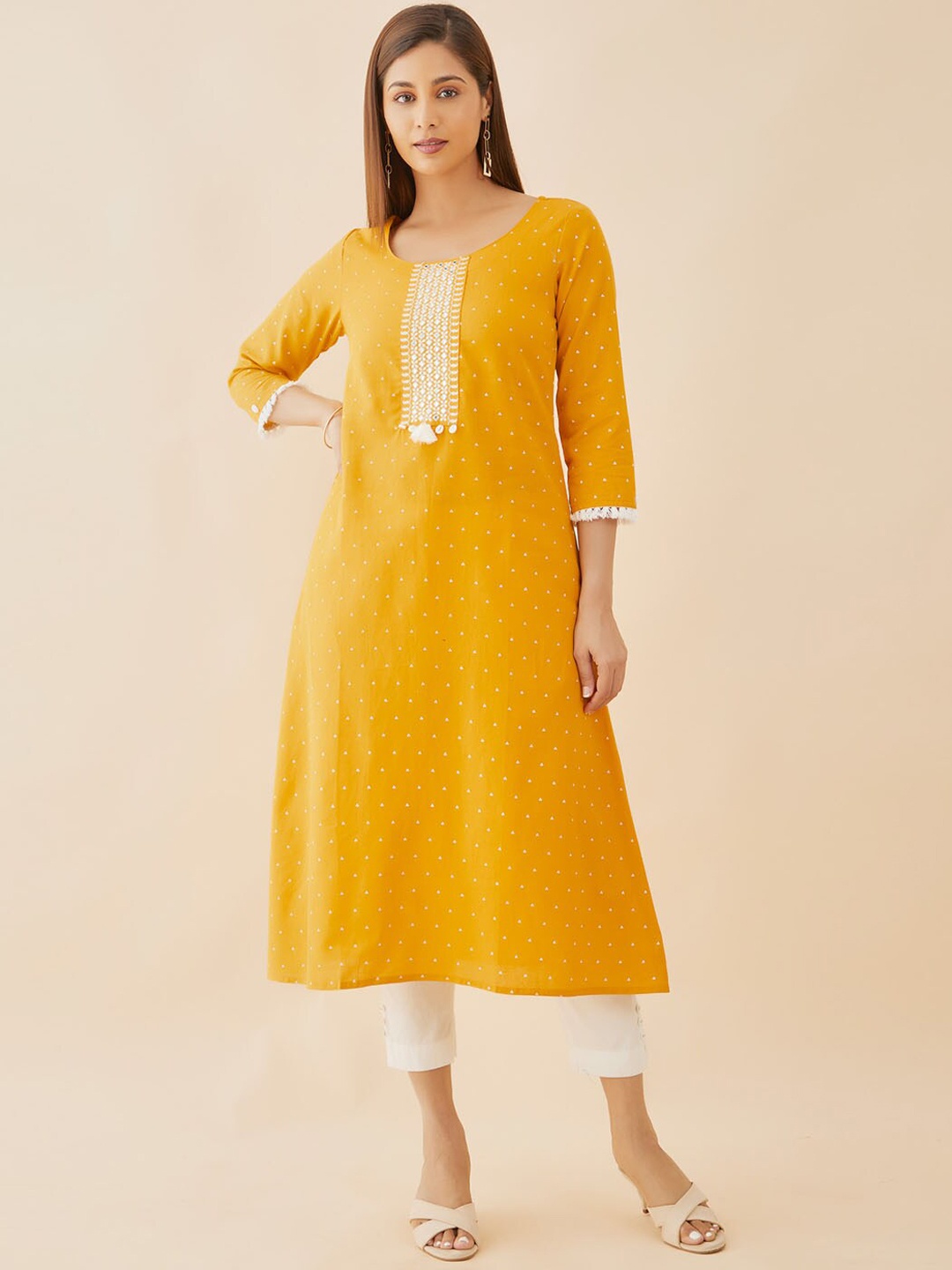 

Maybell Polka Dots Printed Thread Work Kurta, Yellow