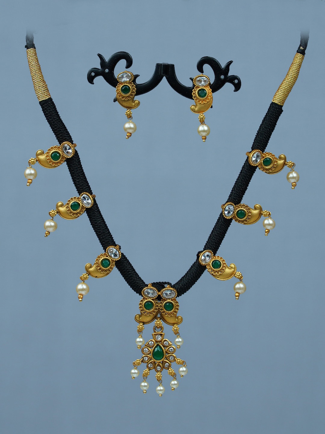 

Diksha collection Gold-Plated Artificial Stone-Studded & Beaded Jewellery Set