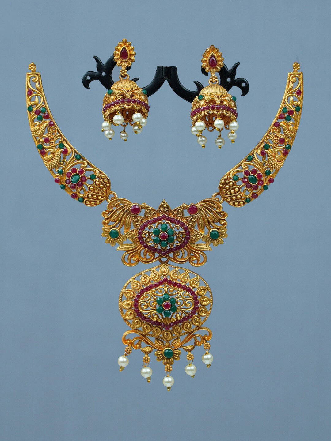 

Diksha collection Gold-Plated Artificial Stone-Studded & Beaded Jewellery Set