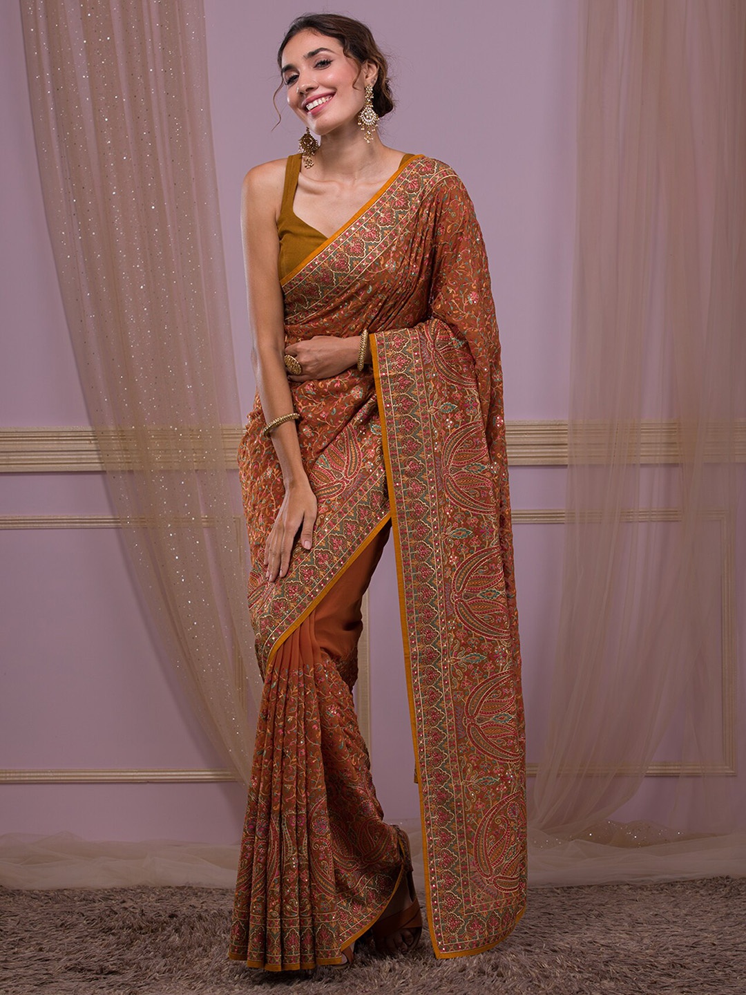 

Koskii Ethnic Motifs Embroidered Festive Saree, Mustard