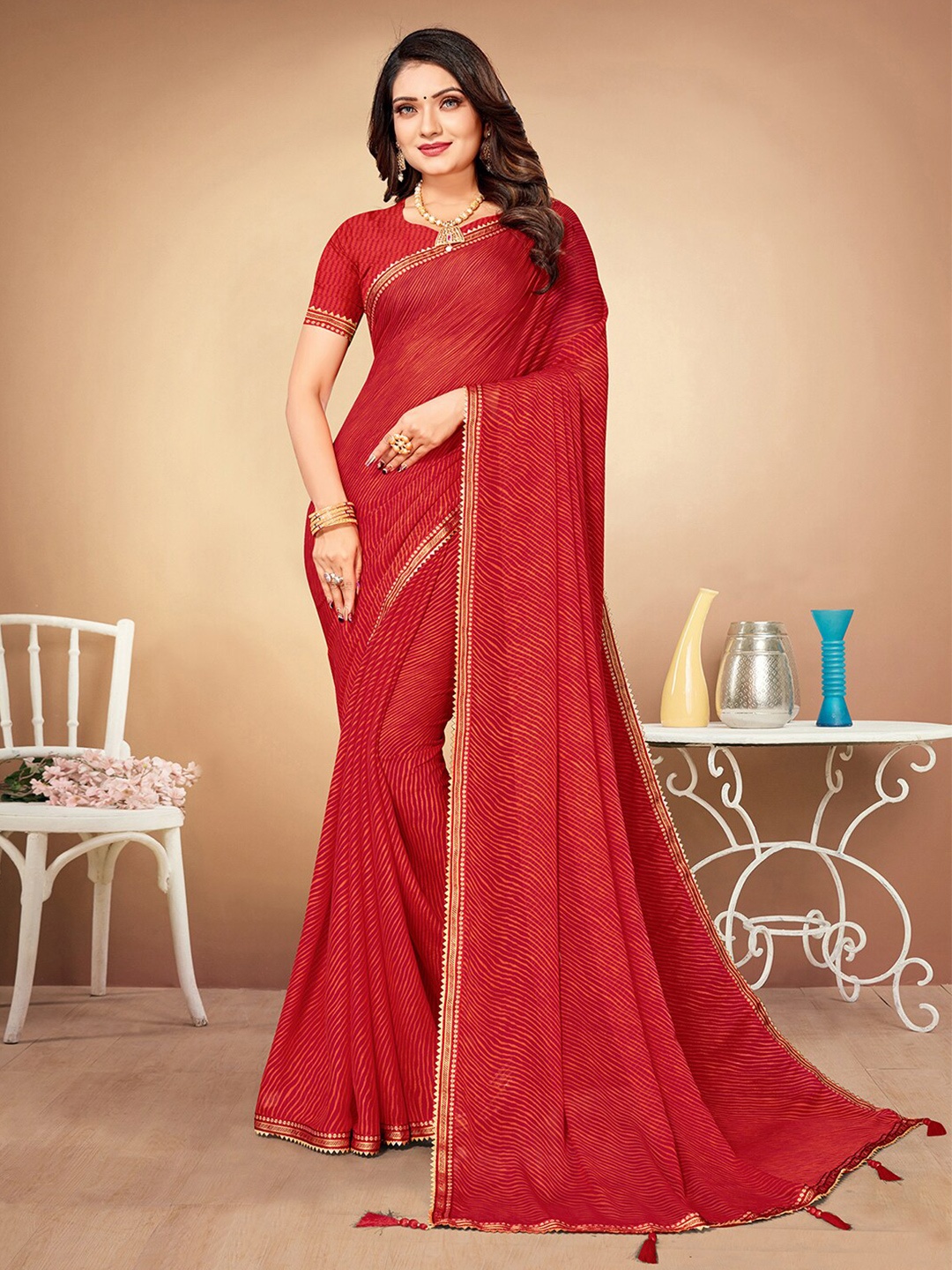 

Mitera Maroon & Gold-Toned Poly Chiffon Leheriya Saree