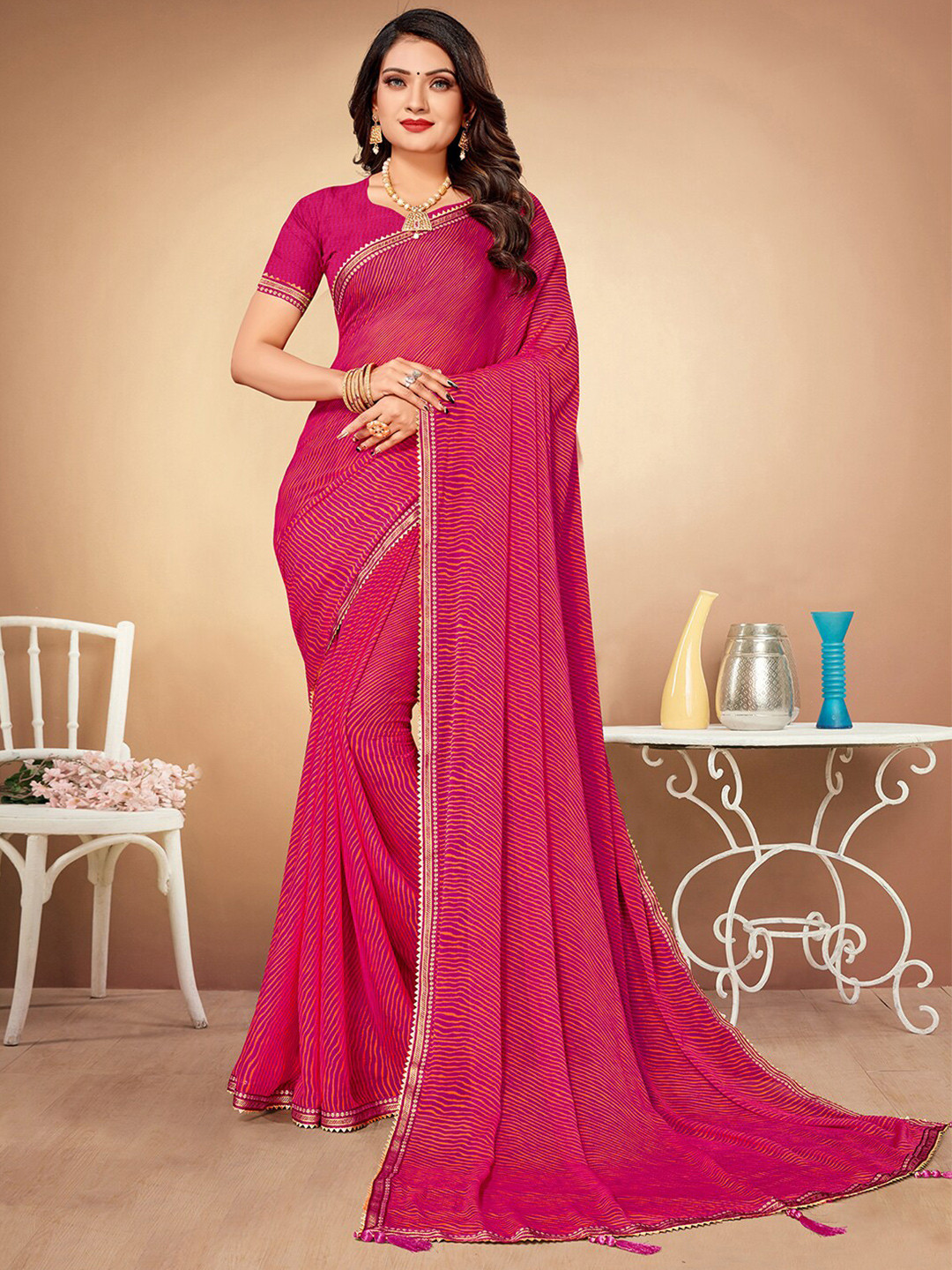 

Mitera Pink Poly Chiffon Leheriya Saree
