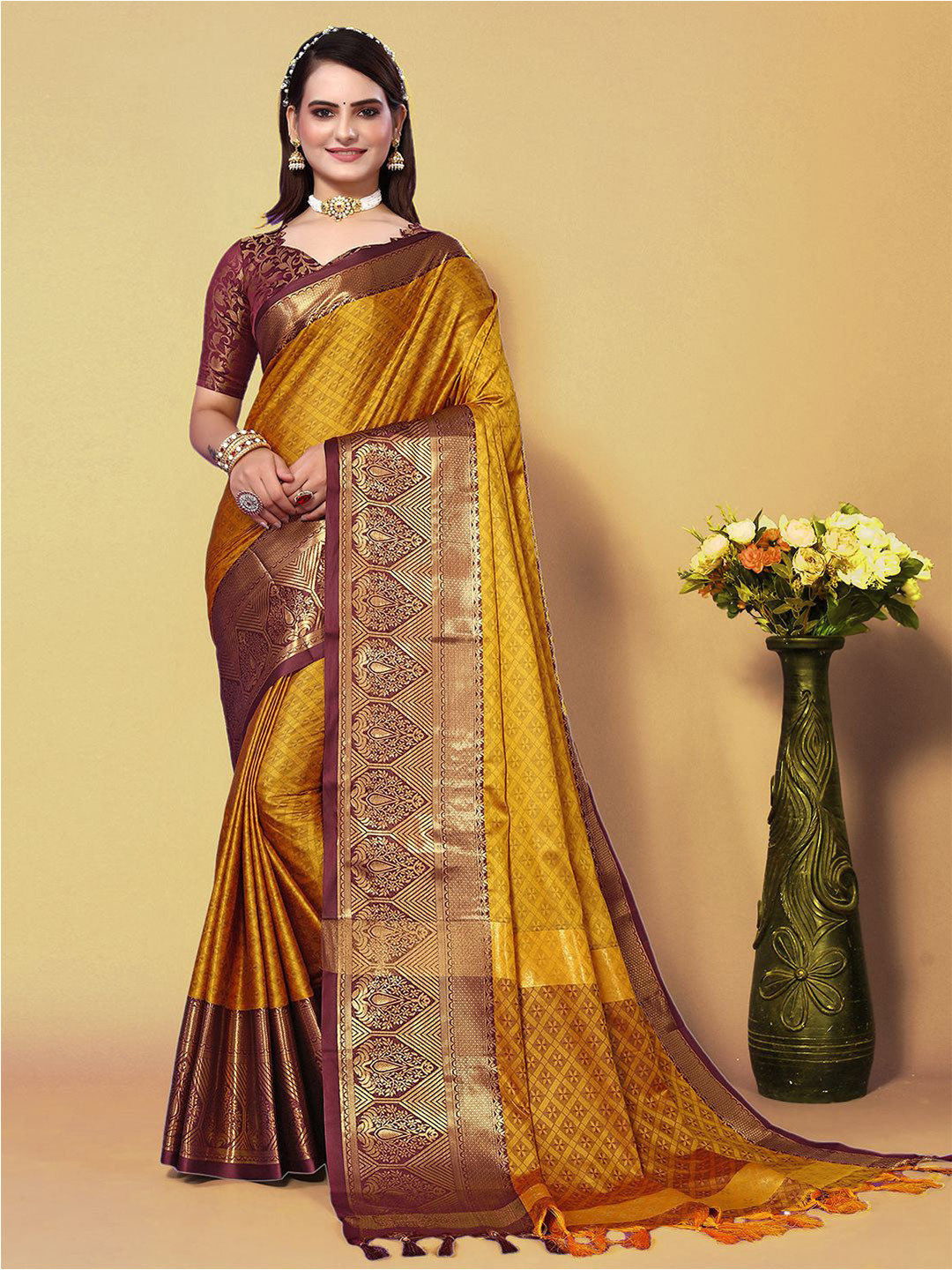

Mitera Yellow & Brown Ethnic Motif Woven Design Zari Silk Cotton Saree