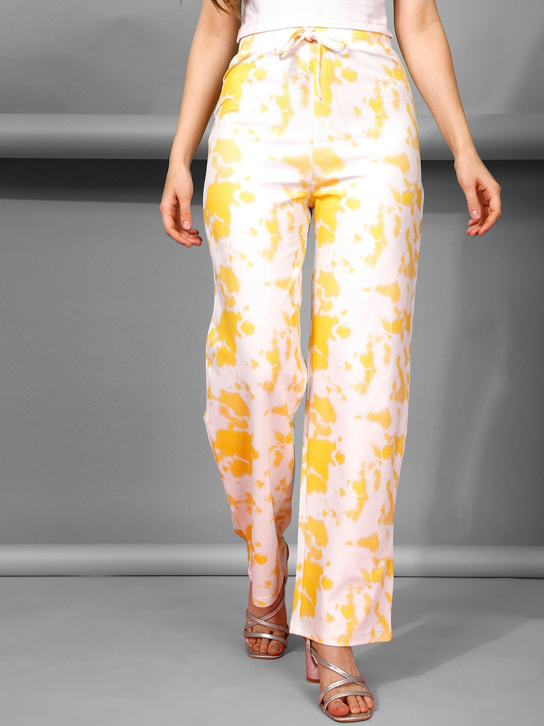 

Selvia Women Abstract Printed Easy Wash Parallel Trousers, Yellow