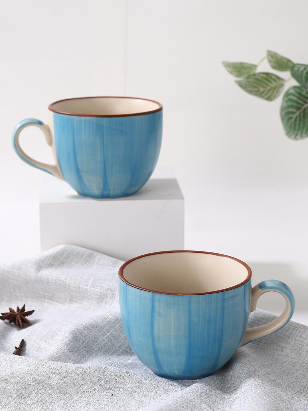 

Wonderchef Blue 2 Pieces Textured Ceramic Tea Cup-200ml