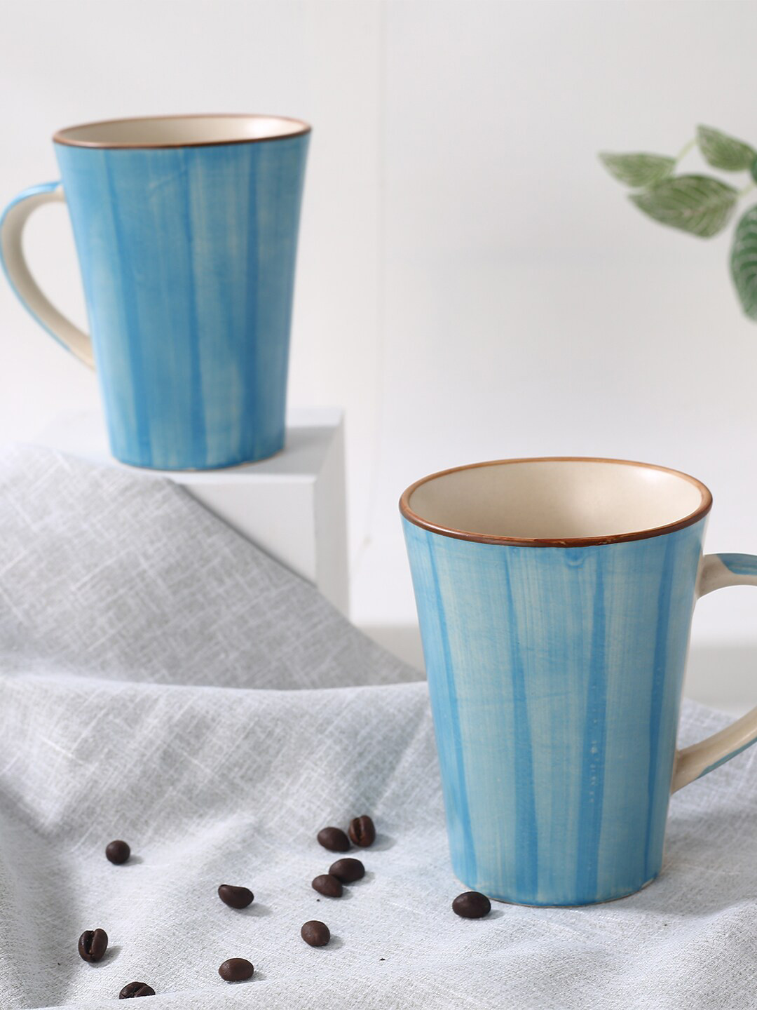

Wonderchef Blue 2 Pcs Textured Stoneware Matte Mugs-300ml