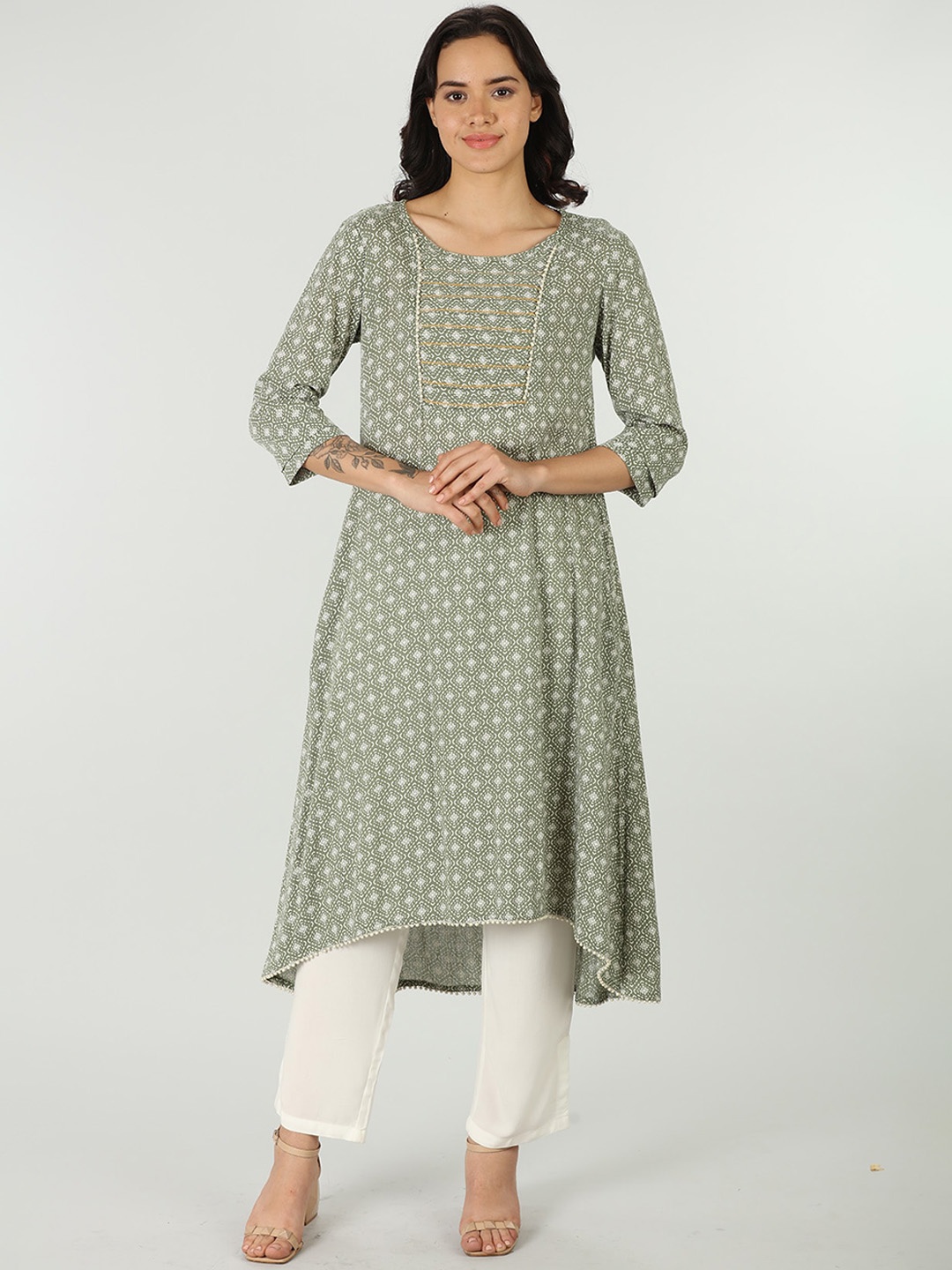 

Mustard Women Ethnic Motifs Printed A-Line High Low Kurta, Green