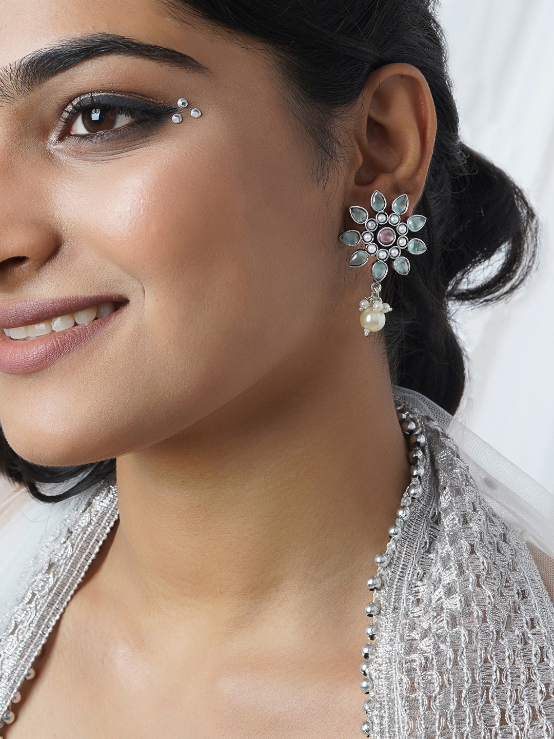 

TEEJH Silver Toned Contemporary Drop Earrings