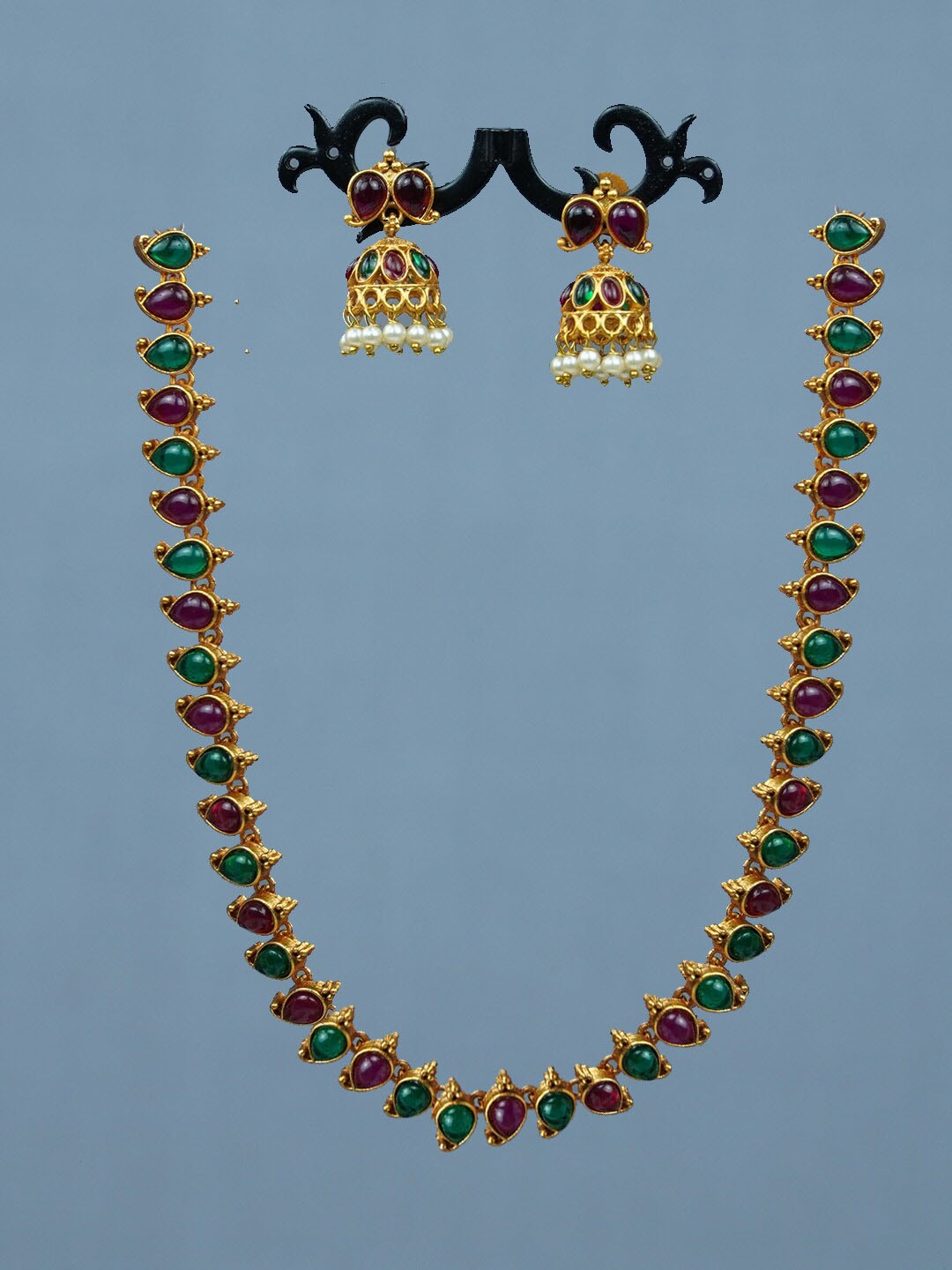 

Diksha collection Gold-Plated Stone-Studded Jewellery Set
