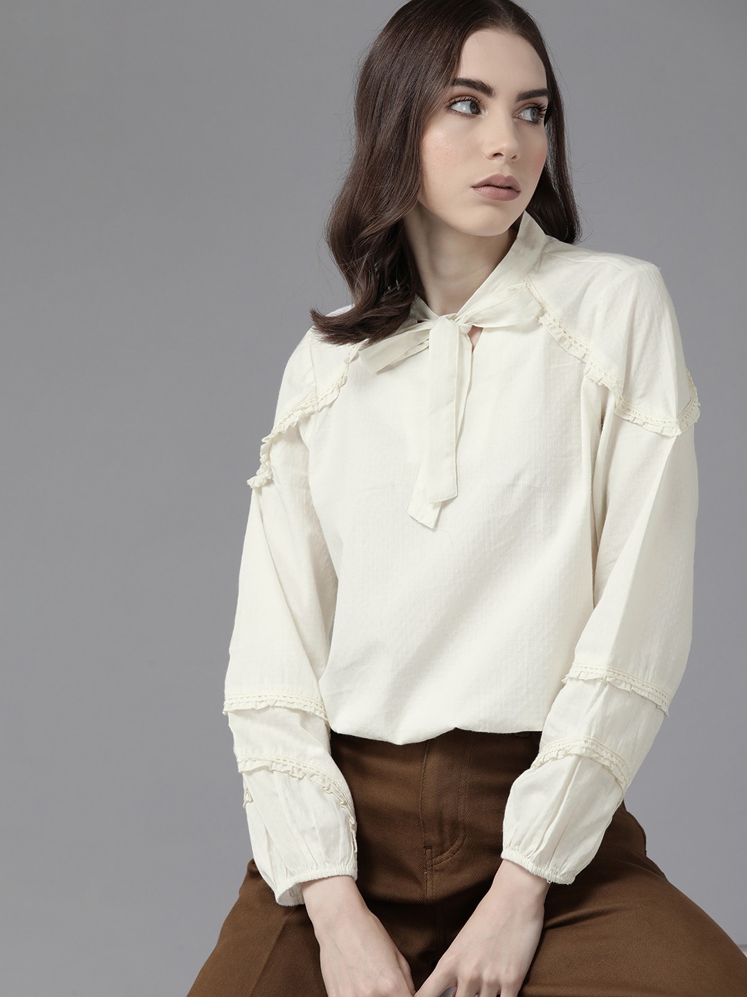 

The Roadster Lifestyle Co. Tie-Up Neck Puff Sleeves Dobby Weave Ruffles Cotton Top, White