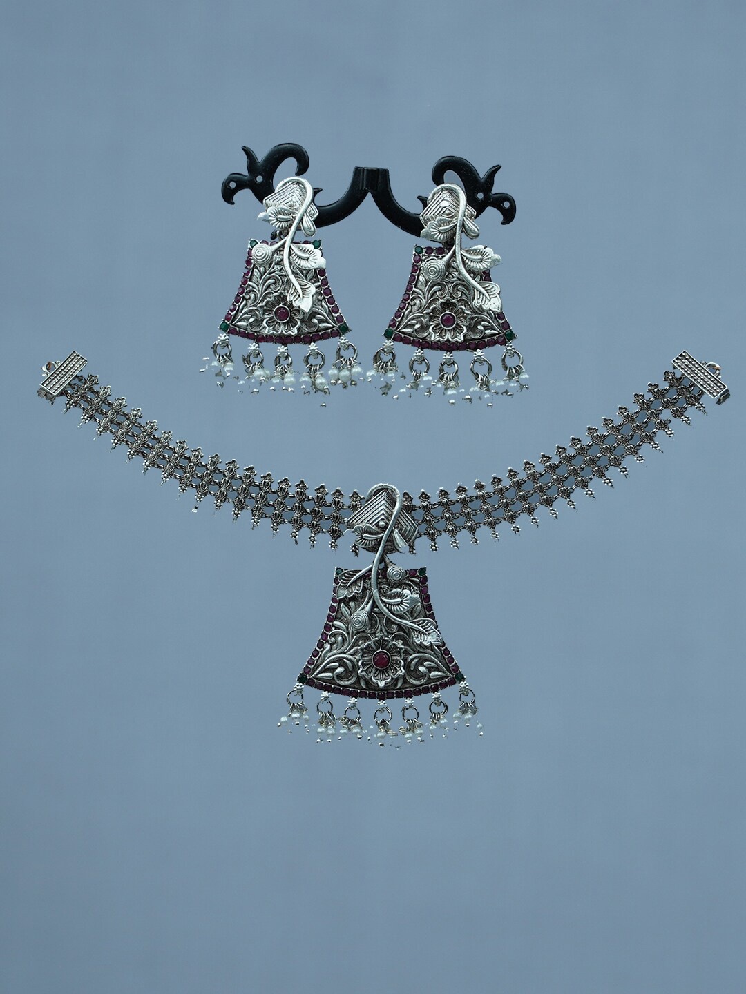 

Diksha collection Silver-Plated Stone Studded & Beaded Jewellery Set