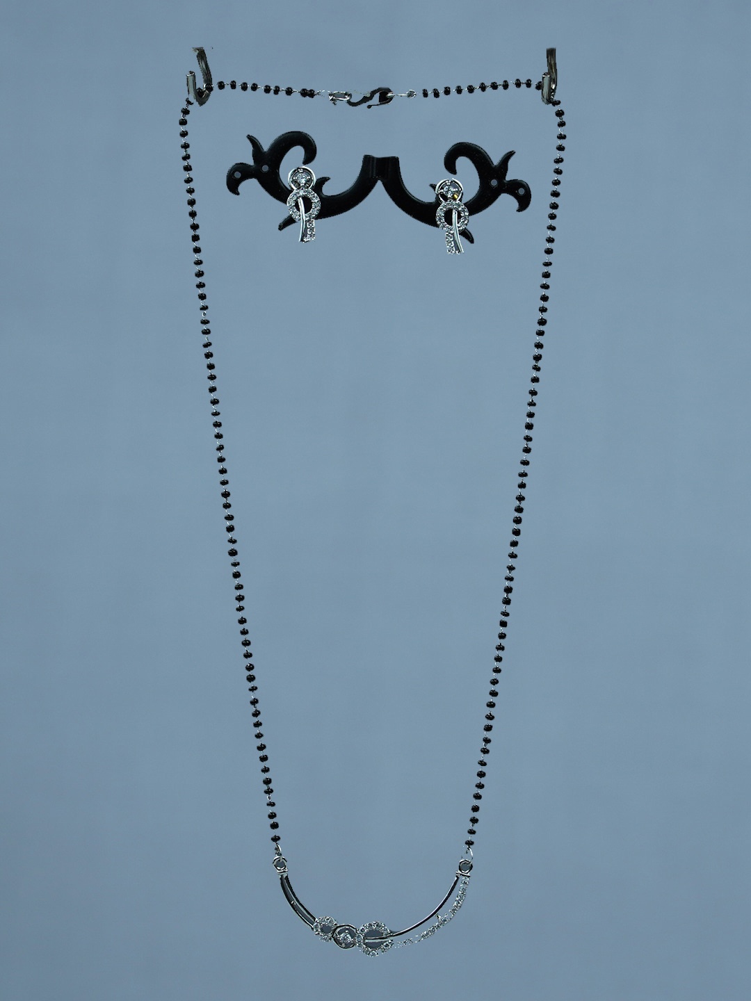 

Diksha collection Silver-Plated Artificial Stones Studded Pendant & Earrings, Black