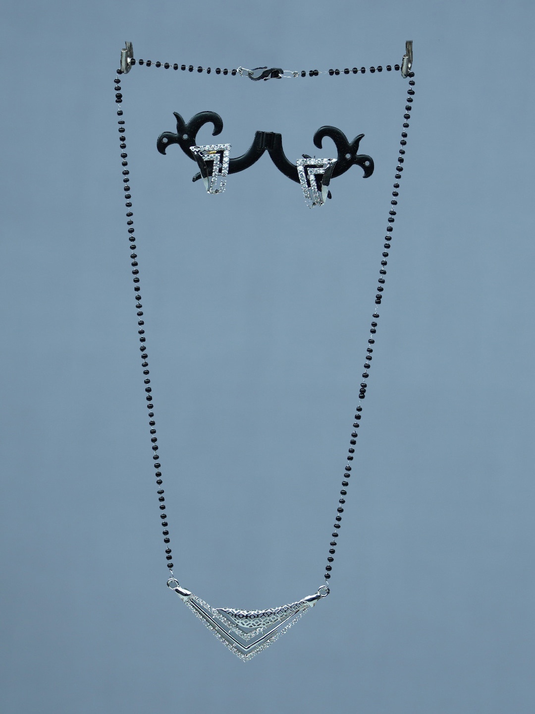 

Diksha collection Silver-Plated Stone Studded Mangalsutra With Earrings