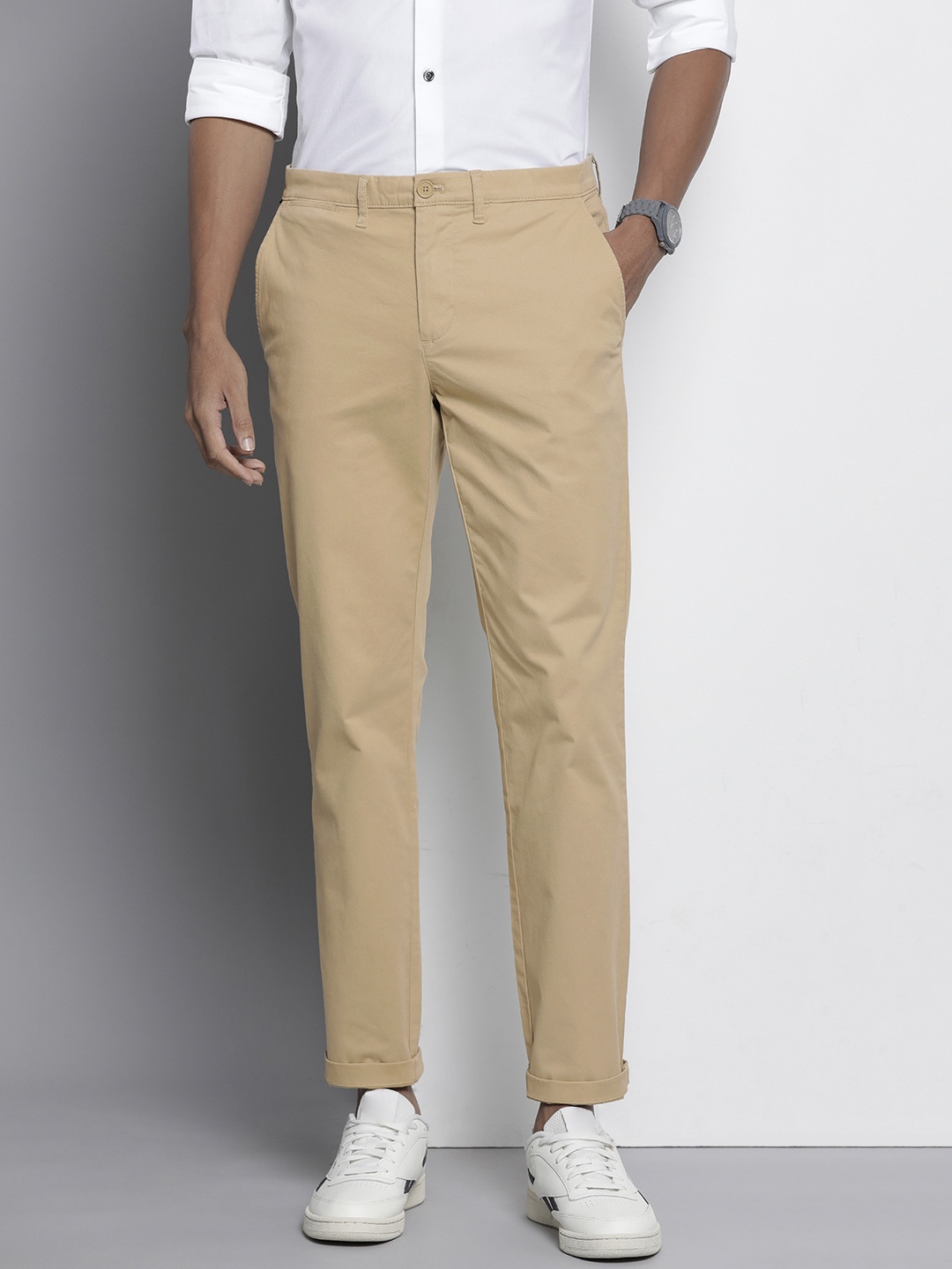 

Tommy Hilfiger Men Solid Slim Fit Chinos Trousers, Beige