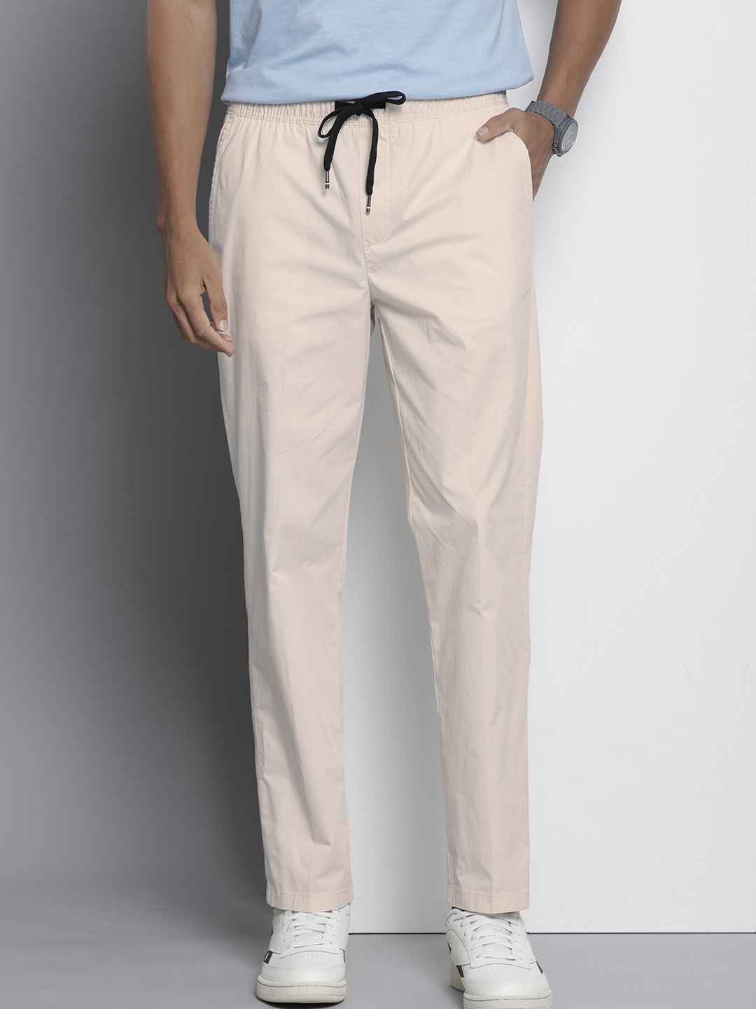 

Tommy Hilfiger Men Solid Mid-Rise Track Pants, Cream