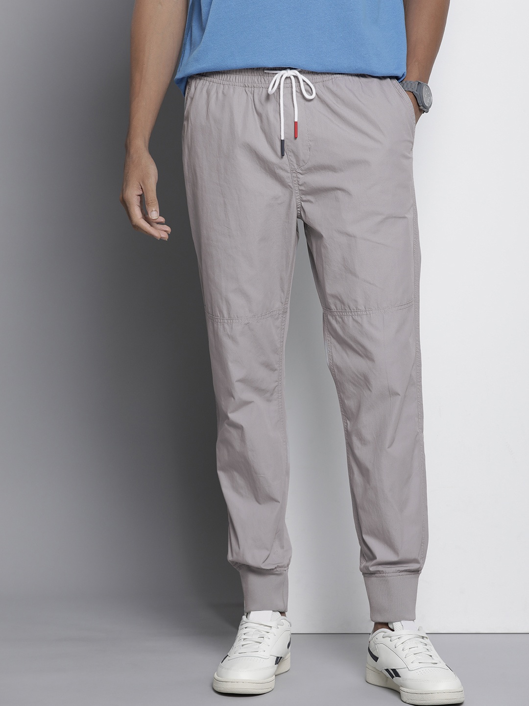 

Tommy Hilfiger Men Pure Cotton Solid Mid-Rise Joggers, Grey