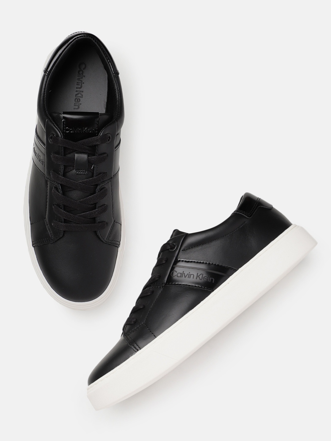 

Calvin Klein Men Solid Leather Sneakers, Black