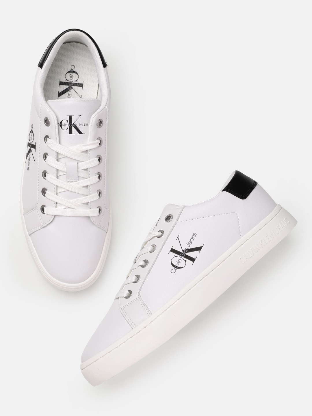 

Calvin Klein Men Solid Leather Sneakers Wikth Minimal Brand Logo Print Detail, White