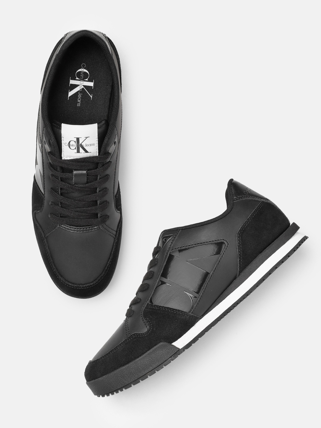 

Calvin Klein Men Low Profile Runner Mix Brand Logo Printed Leather Sneakers, Black
