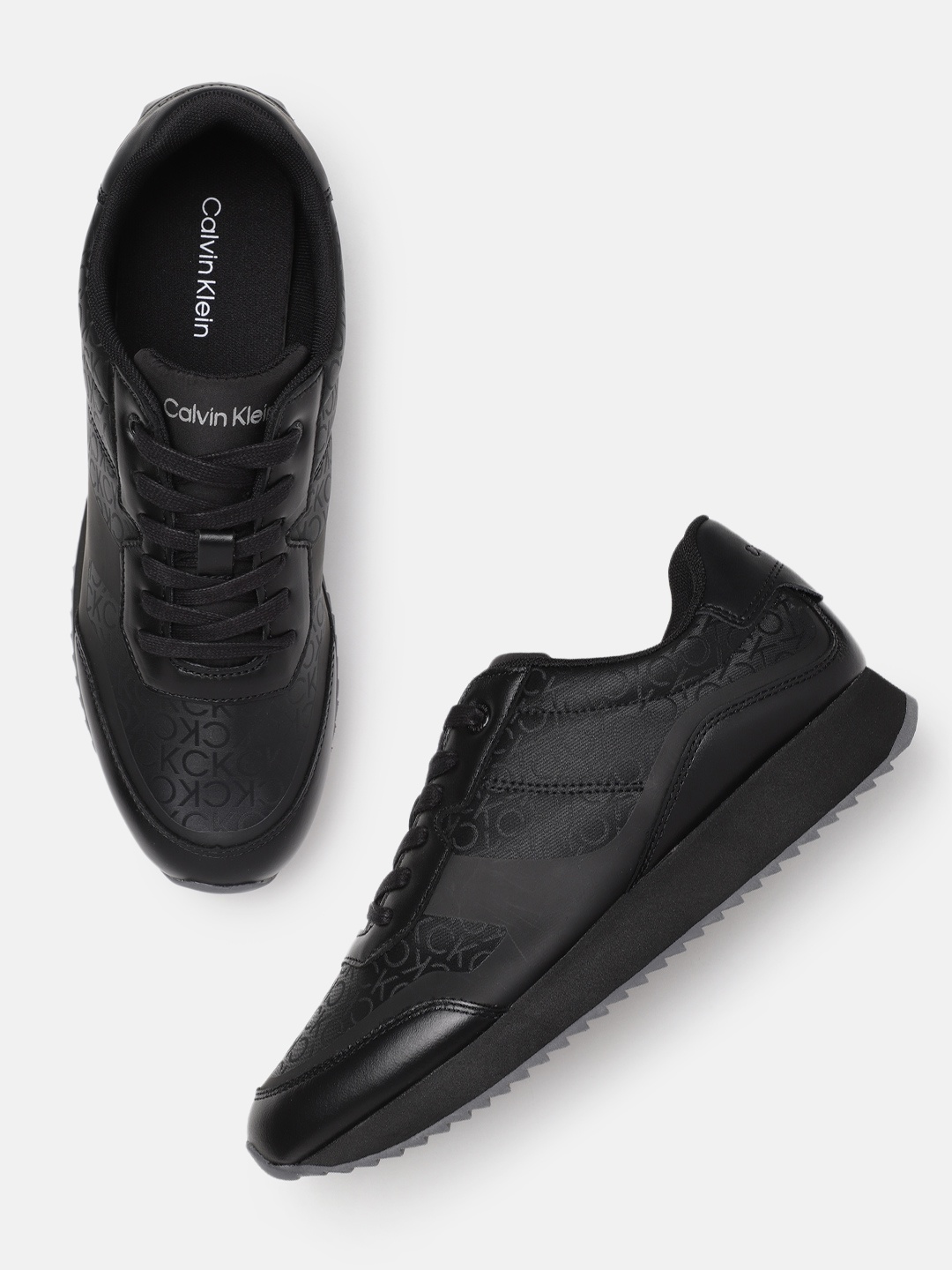 

Calvin Klein Men Low Top Lace Up Heat Bond Mono Brand Logo Printed Sneakers, Black