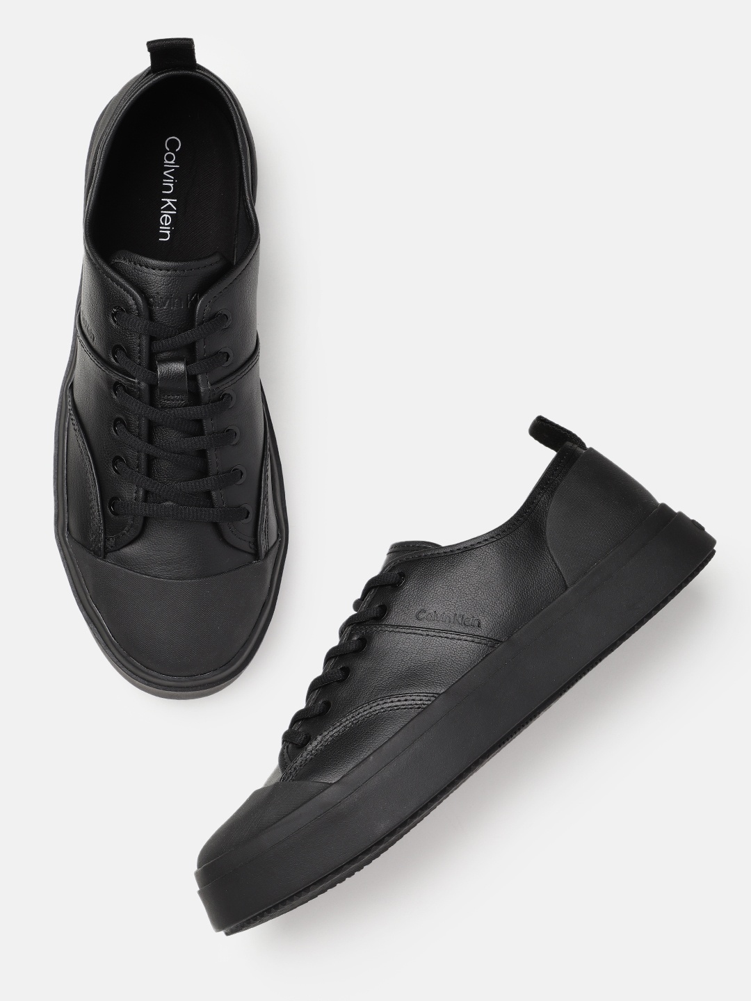 

Calvin Klein Men Solid Leather Sneakers, Black