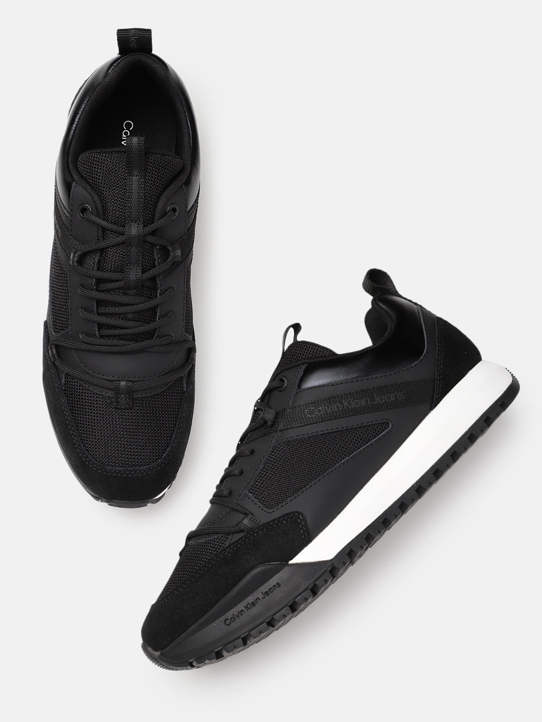 

Calvin Klein Men Toothy Runner Low Laceup Mix Solid Leather Sneakers, Black