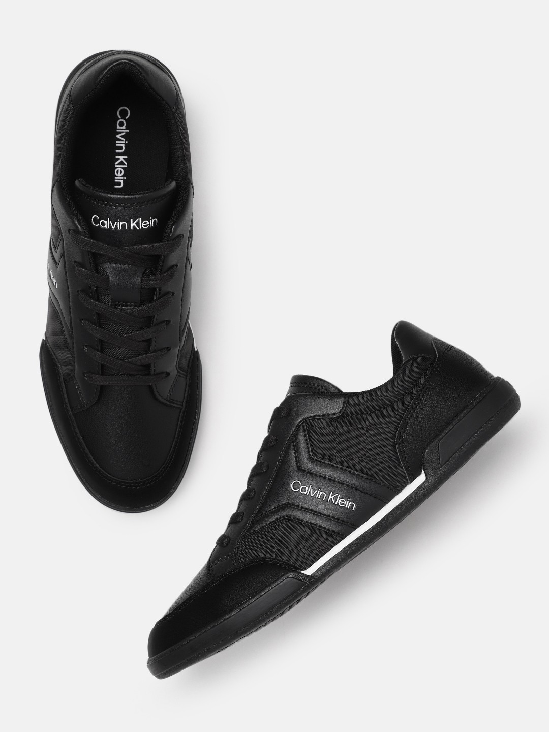 

Calvin Klein Men Low Top Lace Up Mix Solid Sneakers, Black